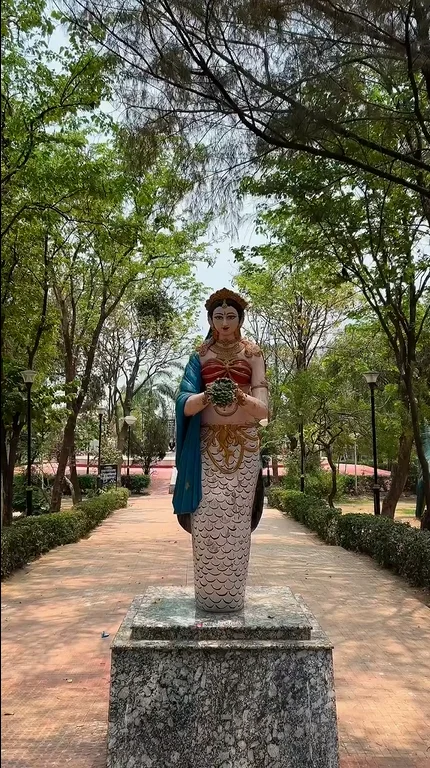 Statue located at the center of Ambedkar Park Gorakhpur surrounded by gardens